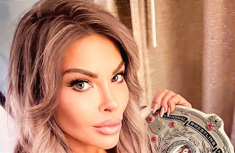 Natalia Markova Poses In Red Lingerie As “Your Early Christmas Present”